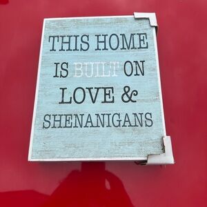 Farmhouse "This home is built on love and shenanigans" home decor sign